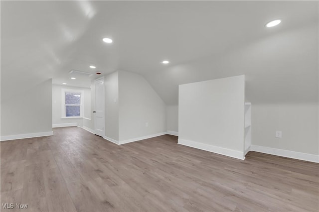 3295 Yorkshire Rd, Cleveland Heights, OH 44118 - additional living space featuring lofted ceiling, wood finished floors, and recessed lighting