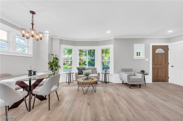 3295 Yorkshire Rd, Cleveland Heights, OH 44118 - dining area featuring a chandelier, crown molding, light wood-style floors, and recessed lighting