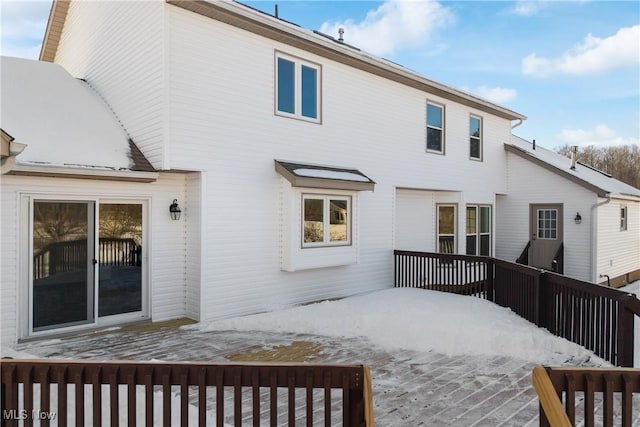 rear view of house with a deck