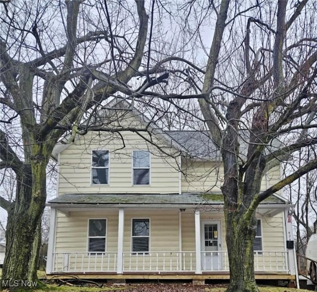 view of home's exterior with covered porch