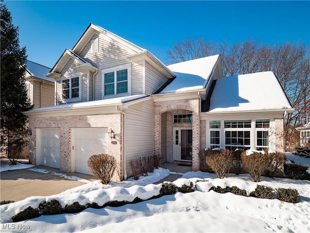 view of front of property with a garage