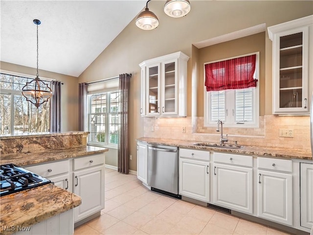 kitchen with white cabinetry, sink, hanging light fixtures, and dishwasher