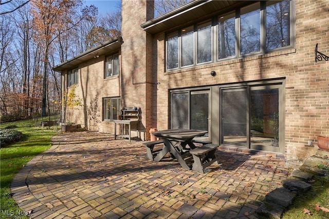 rear view of house with a patio area