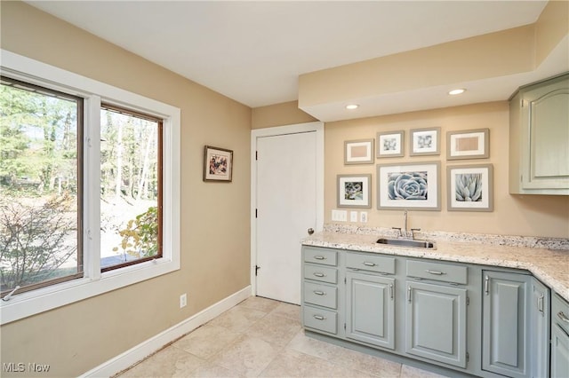 bathroom featuring vanity and a wealth of natural light