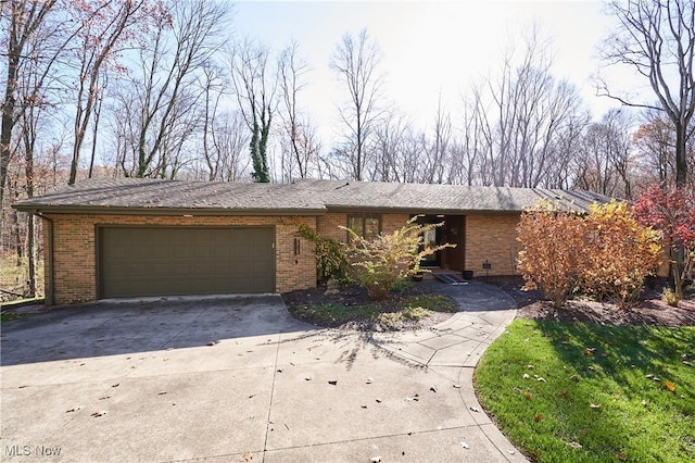 single story home with a garage