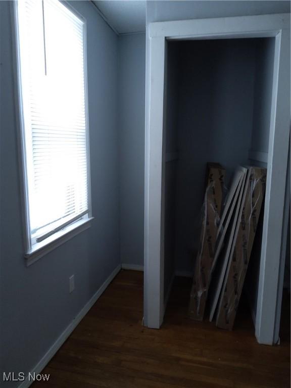 interior space with dark wood-type flooring