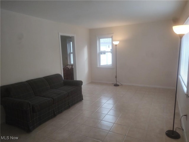 living room with light tile patterned floors