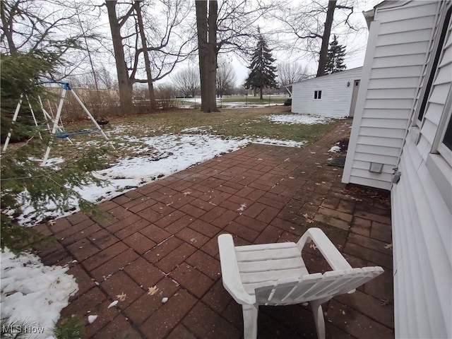 view of snow covered patio