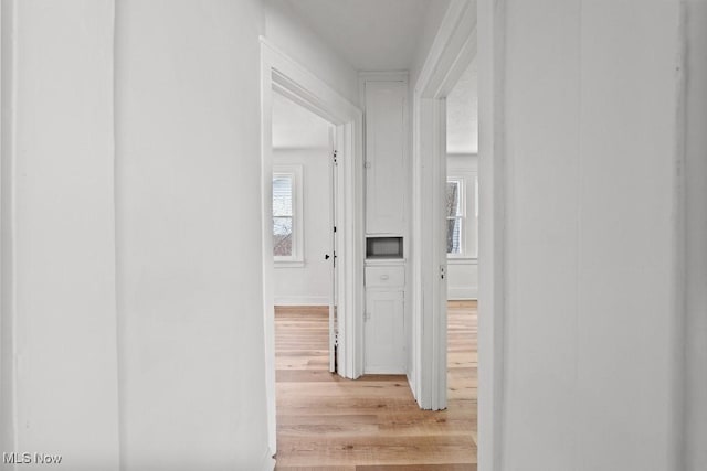 hall featuring light hardwood / wood-style flooring