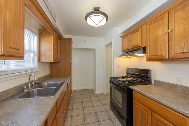 kitchen with sink, light tile patterned floors, and black range with gas stovetop