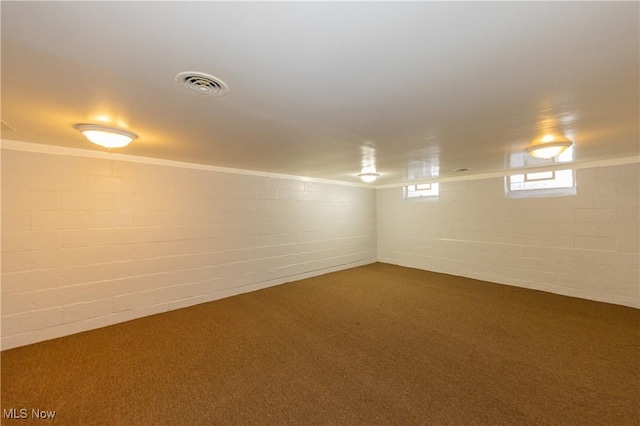 basement with carpet flooring