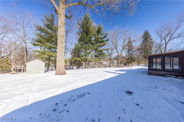 view of yard covered in snow