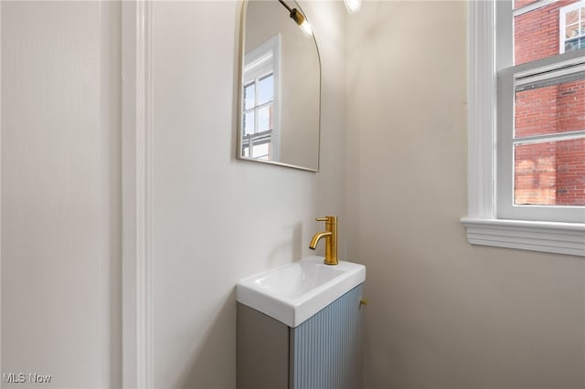 bathroom featuring vanity and plenty of natural light