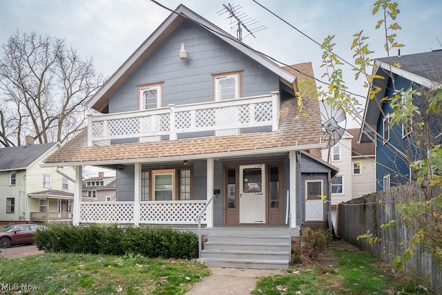 view of front of home with a balcony