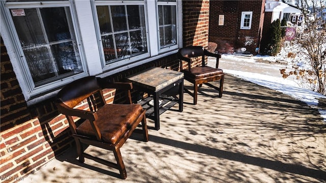 view of snow covered patio