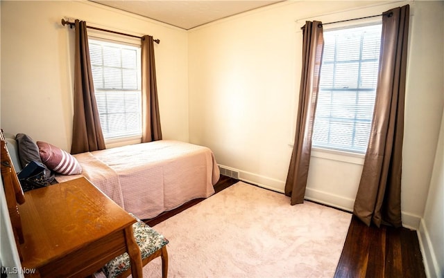 bedroom featuring hardwood / wood-style floors