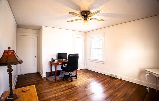 office featuring dark hardwood / wood-style floors, a textured ceiling, and ceiling fan