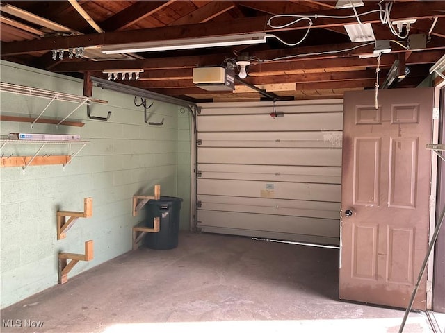 garage featuring a garage door opener