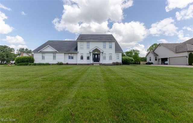 5420 Cloisters Dr, Canfield, OH 44406 - rear view of property with a lawn