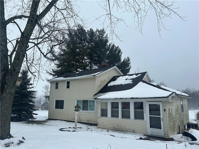 view of snow covered property