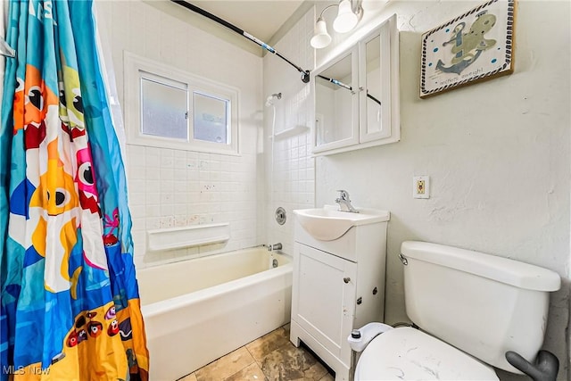 full bathroom featuring vanity, shower / bath combination with curtain, and toilet