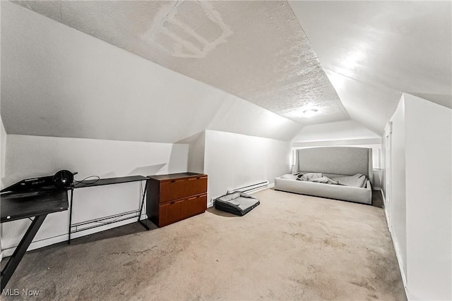 bonus room with a baseboard radiator, lofted ceiling, carpet floors, and a textured ceiling