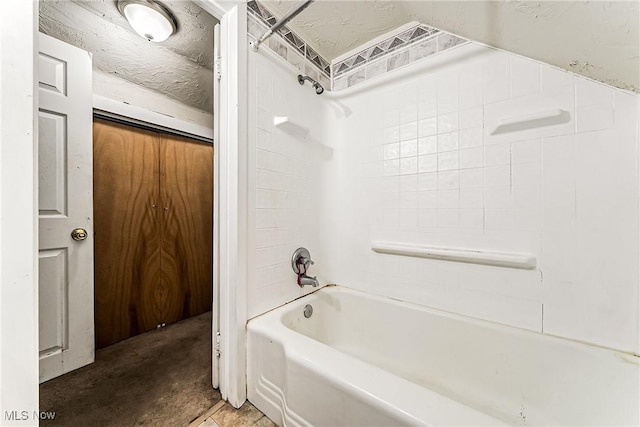 bathroom featuring  shower combination