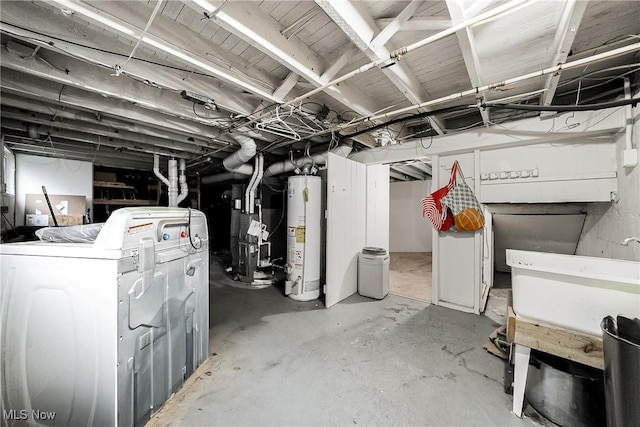 basement featuring washer / clothes dryer, water heater, and gas water heater