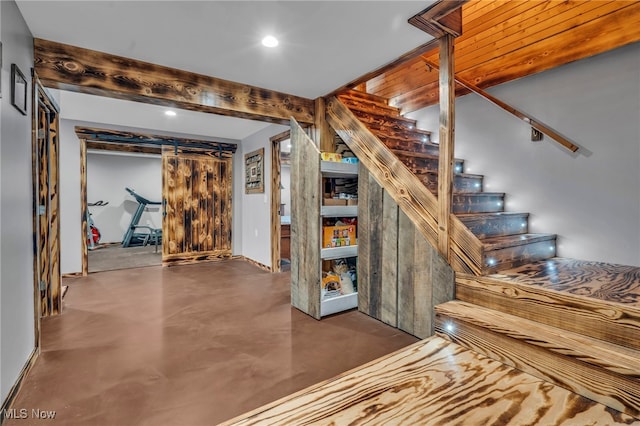 stairway with concrete floors