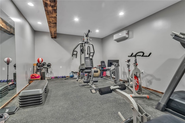 workout area with a wall mounted air conditioner