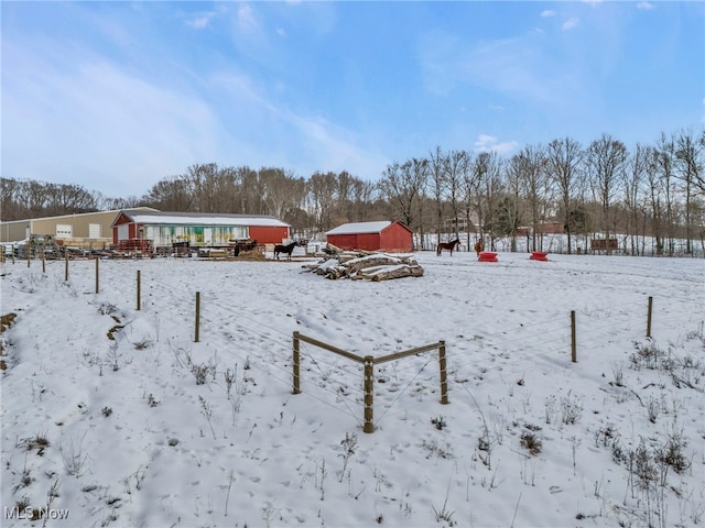 view of yard covered in snow