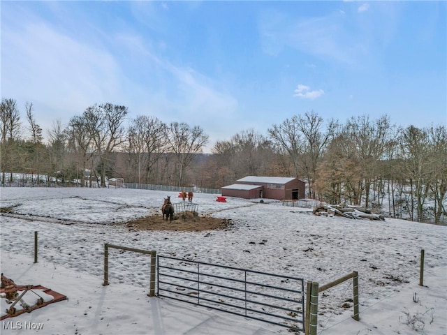 view of yard layered in snow