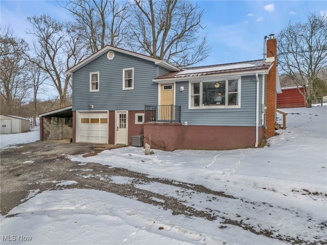 tri-level home with a garage