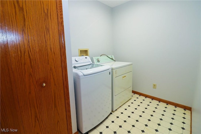 laundry area with separate washer and dryer