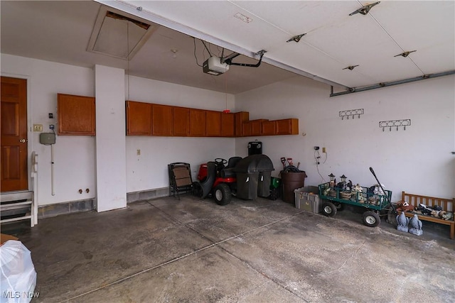 garage featuring a garage door opener