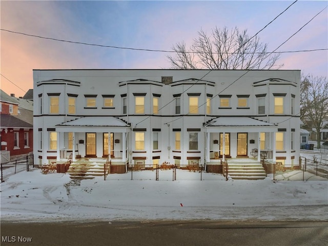 view of snow covered building