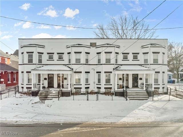 view of snow covered property