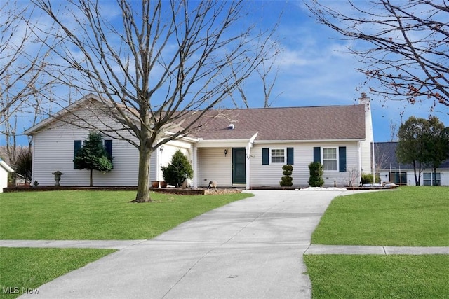 single story home featuring a front yard