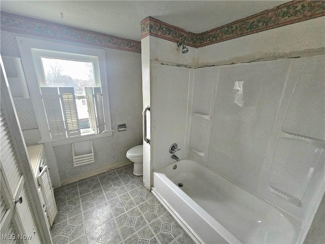 full bathroom with shower / washtub combination, toilet, and vanity