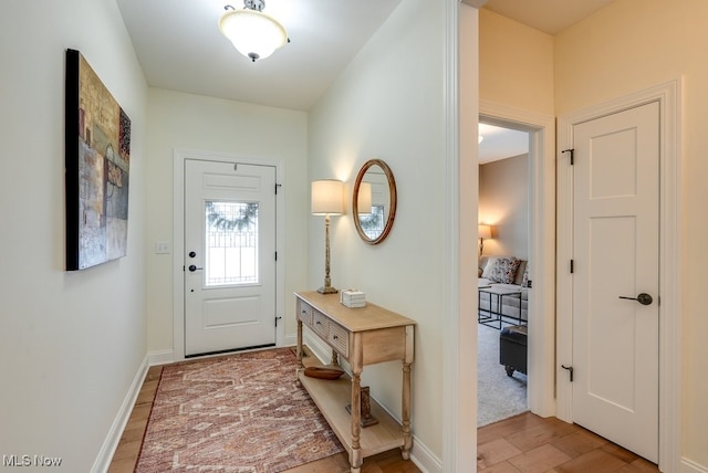 doorway to outside with light hardwood / wood-style floors