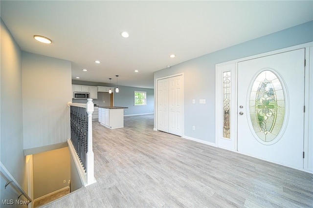 entrance foyer featuring light hardwood / wood-style flooring