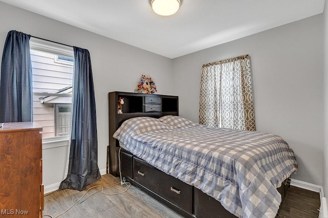 bedroom with light hardwood / wood-style flooring