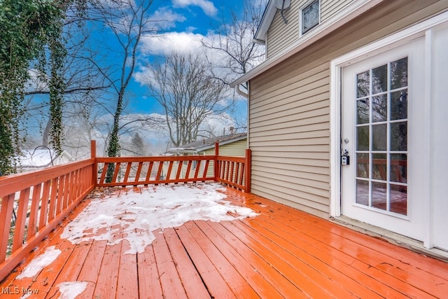 view of snow covered deck