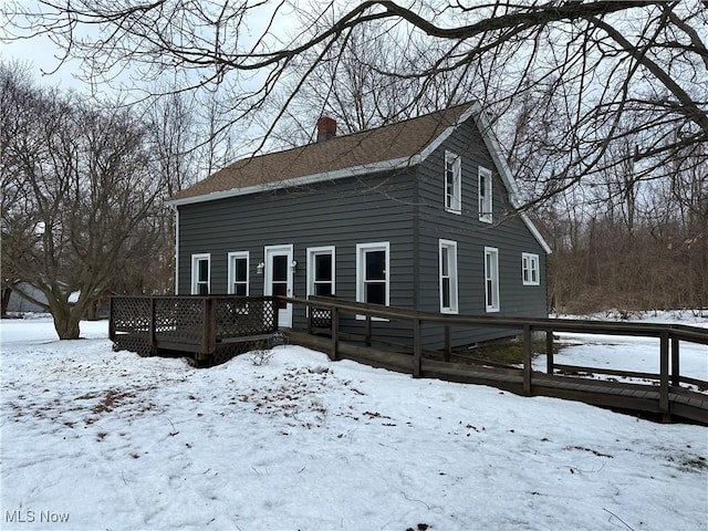 view of front of property featuring a wooden deck