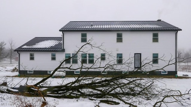 view of snow covered property