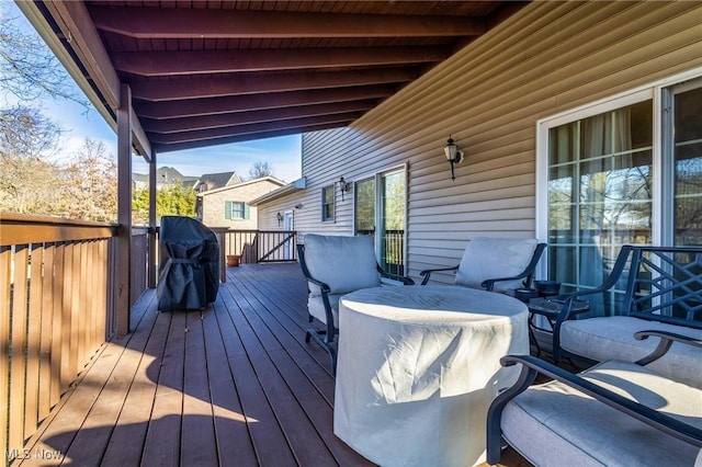 wooden terrace with grilling area