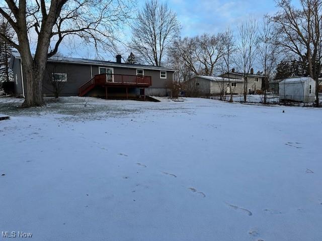 exterior space featuring a wooden deck