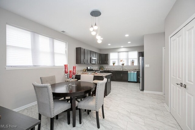 dining space with sink