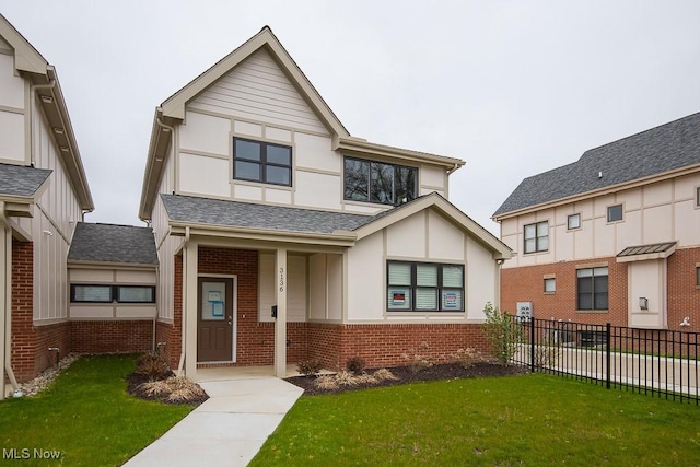 view of front of property with a front lawn