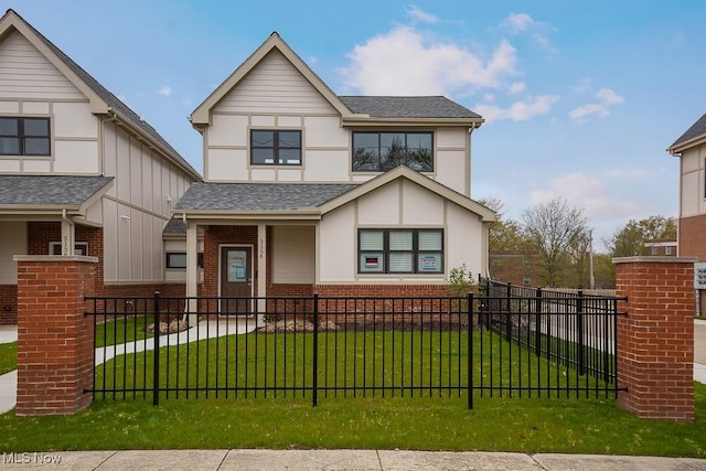 view of front of home featuring a front lawn